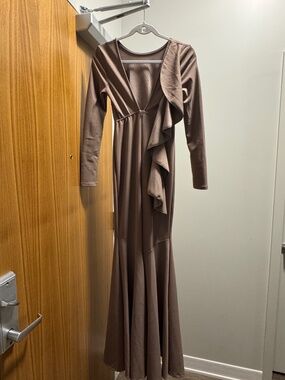 Evening Gown: Long, floor-length fitted dress